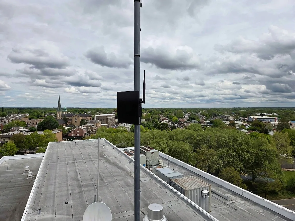 A Beacon antenna on a rooftop mast over Trenton, New Jersey